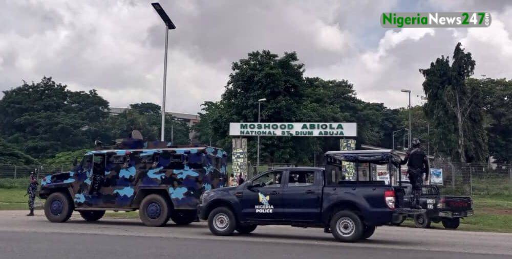 Nigerian Police vehicles used to barricade Abuja stadium on Saturday