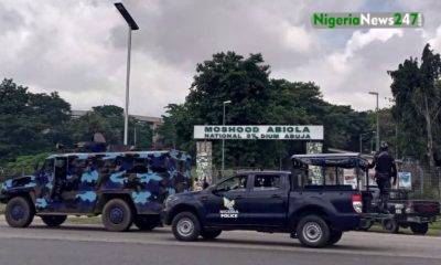 Nigerian Police vehicles used to barricade Abuja stadium on Saturday
